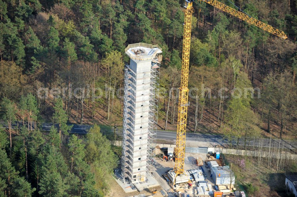 PRÖTZEL OT Heidekrug from the bird's eye view: Baustelle zur Errichtung eines Wetterradarturmes des DWD auf dem Gelände der ehemaligen Kaserne Heidekrug. Der durch die mib - märkische ingenieurbau gmbh errichtete Stahlbetonturm wurde eingerüstet durch die Frirma Schröter Gerüstbau. Construction site to build a weather radar tower of the DWD in the grounds of the former barracks Heidekrug.