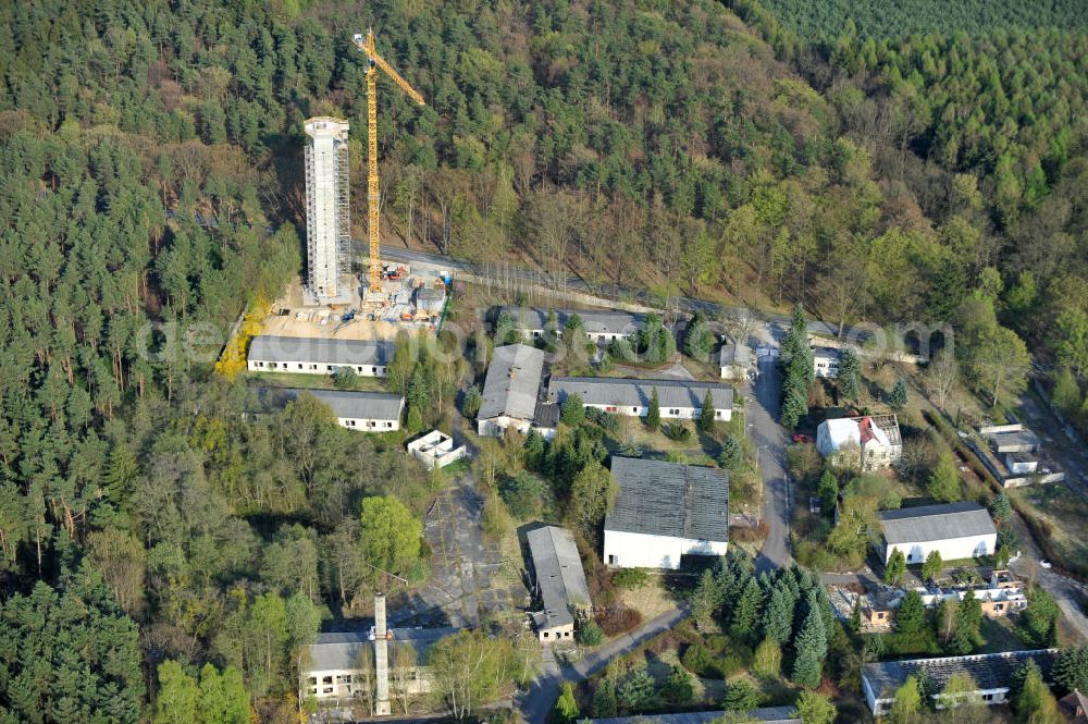 PRÖTZEL OT Heidekrug from the bird's eye view: Baustelle zur Errichtung eines Wetterradarturmes des DWD auf dem Gelände der ehemaligen Kaserne Heidekrug. Der durch die mib - märkische ingenieurbau gmbh errichtete Stahlbetonturm wurde eingerüstet durch die Frirma Schröter Gerüstbau. Construction site to build a weather radar tower of the DWD in the grounds of the former barracks Heidekrug.