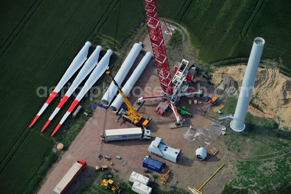 Aerial photograph Breddin - Construction site to build a wind power station - wind turbine company Vestas of a car-crane Mammoet company on a field near Breddin in Brandenburg