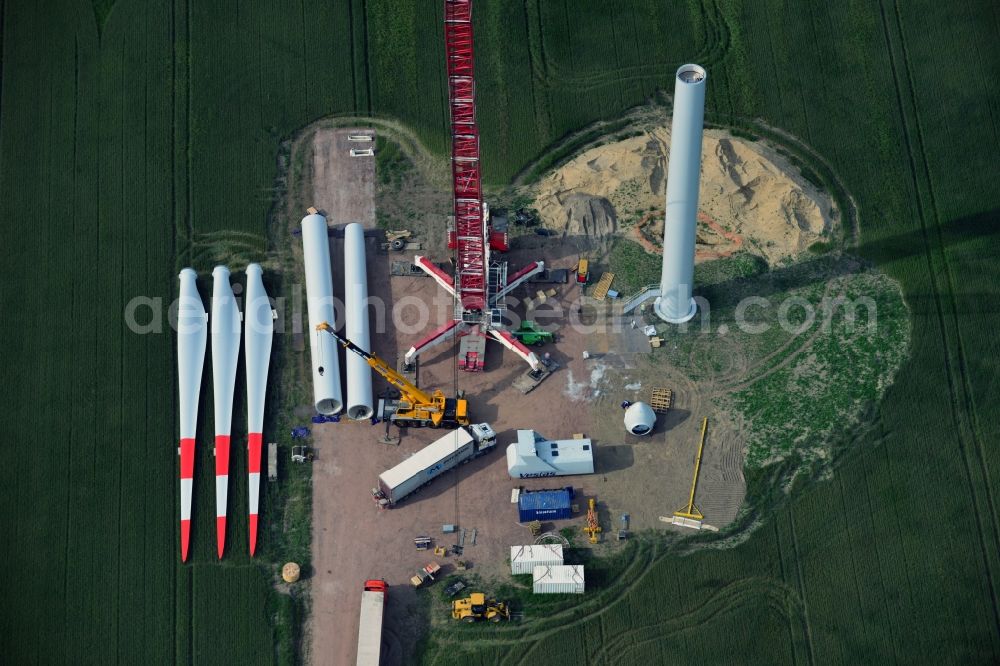 Aerial image Breddin - Construction site to build a wind power station - wind turbine company Vestas of a car-crane Mammoet company on a field near Breddin in Brandenburg