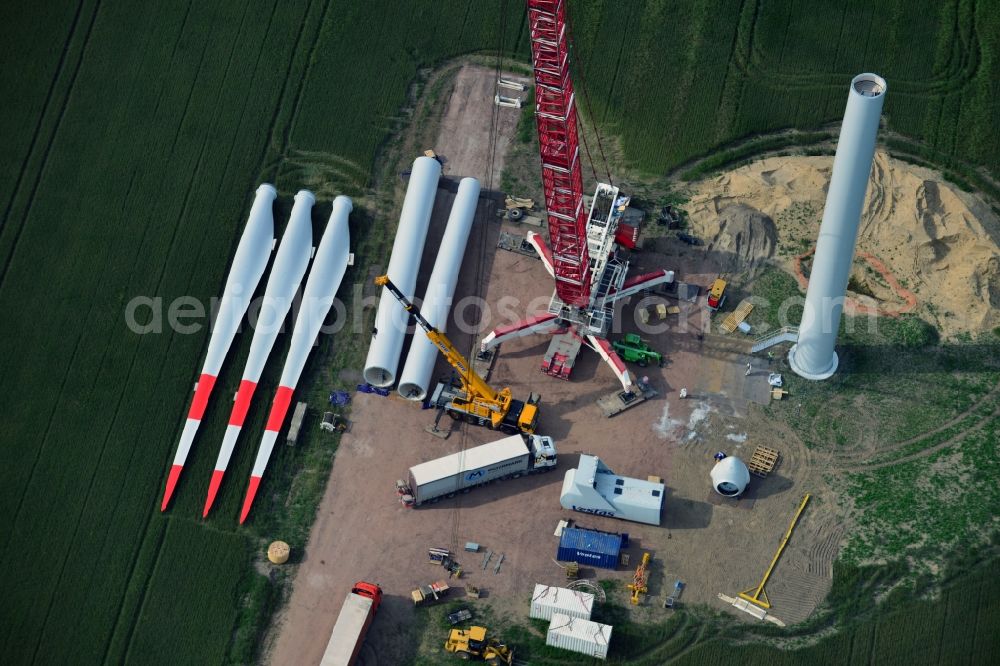 Aerial photograph Breddin - Construction site to build a wind power station - wind turbine company Vestas of a car-crane Mammoet company on a field near Breddin in Brandenburg