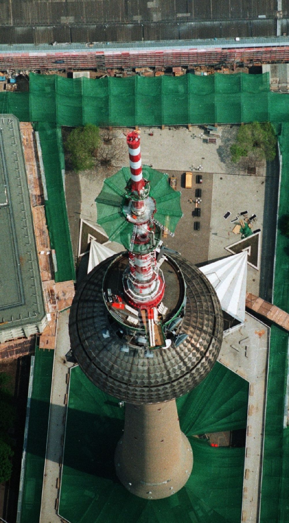 Aerial image Berlin Mitte - Construction site for the extension and increase of the antenna carrier-mast on the ball of the Berlin TV Tower in Berlin - Mitte