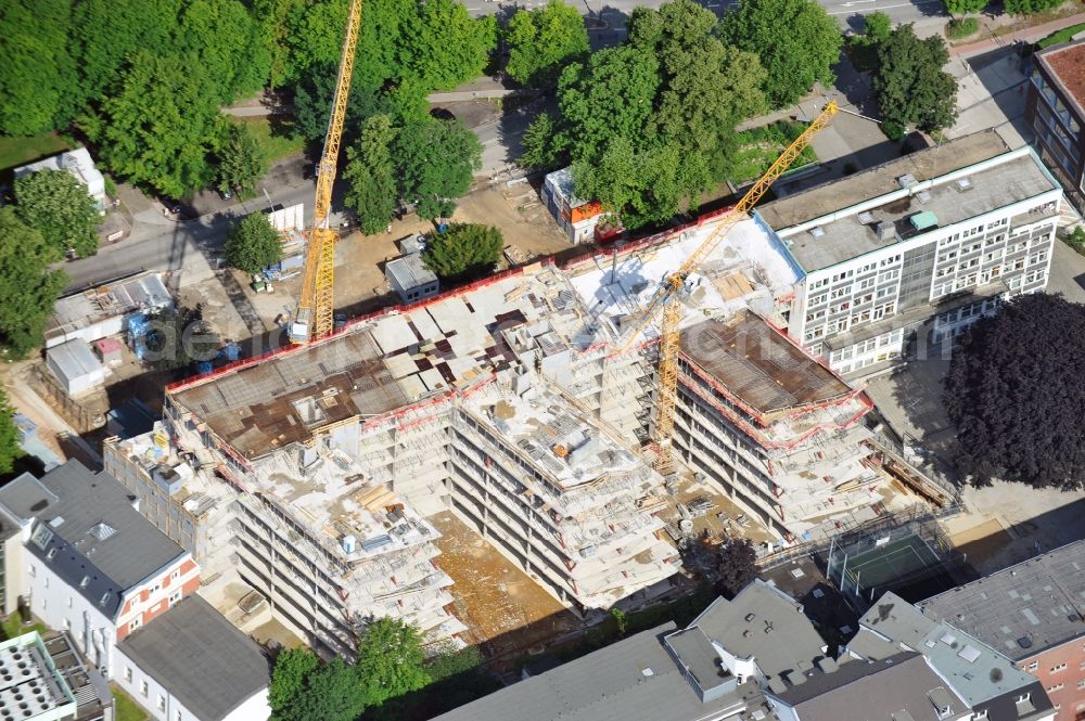 Hamburg from above - The construction site for the redevelopment of the Raven Street HanseMerkur AG in Hamburg. The redesign of the residential and commercial building complex with a daycare center and restaurant is designed by the Hamburg architectural firm Bothe Richter Teherani BRT Architects