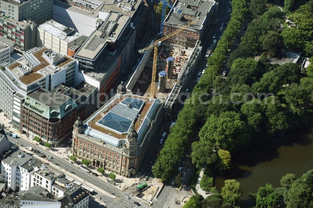 Aerial photograph Hamburg - Construction site for the redevelopment of the historical post office complex Alte Post am Stephansplatz in Hamburg. The historical complex is being redeveloped and regenerated and new office and commercial units of Work Life Center are being built