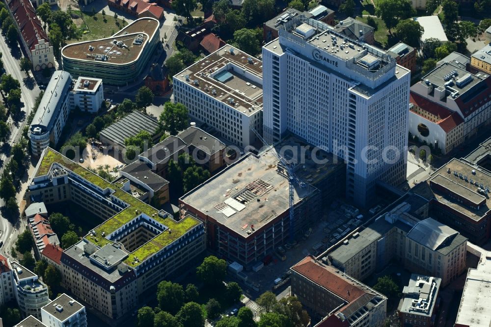 Berlin from the bird's eye view: Construction site for the renovation of a building on the clinic premises of the hospital CHARITE on Luisenstrasse corner Hannoversche Strasse in the district Mitte in Berlin, Germany