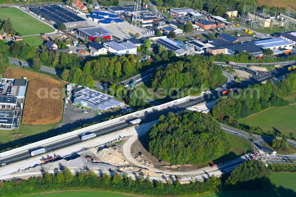 Paderborn from the bird's eye view: Construction site for the rehabilitation of the route and lanes in the course of the exit and access to the motorway junction of the BAB A33 in the district Elsen in Paderborn in the state North Rhine-Westphalia, Germany