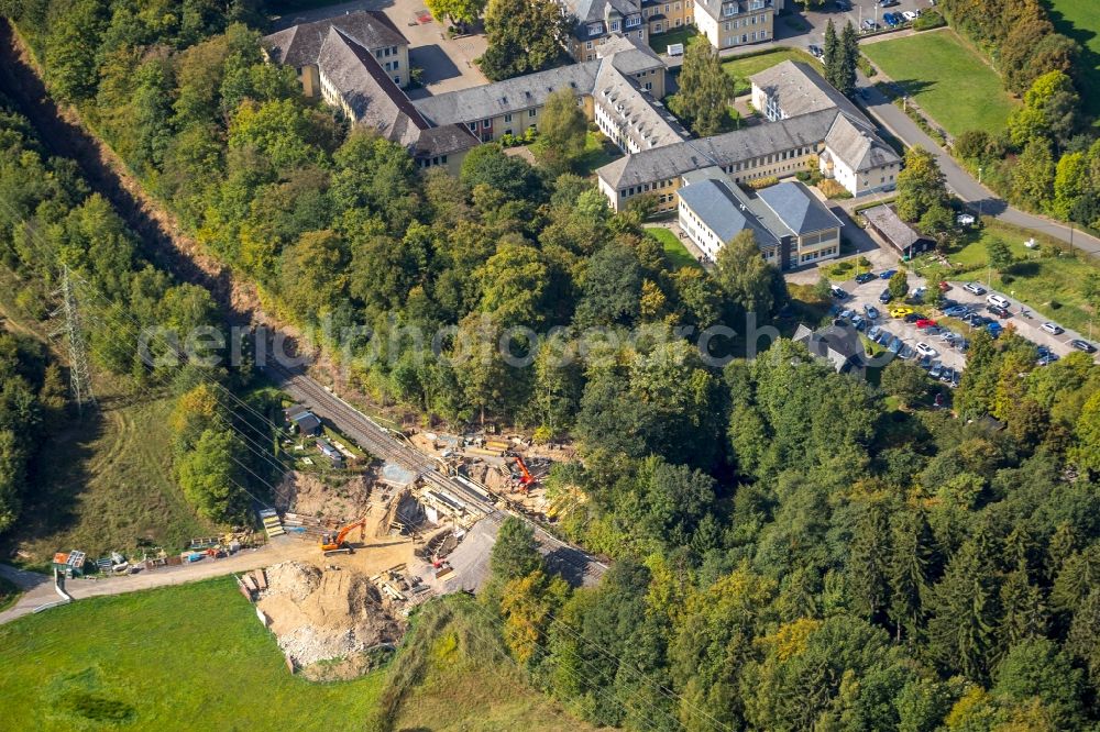 Aerial image Hilchenbach - Construction for the renovation of the railway bridge building to route the train tracks in Hilchenbach in the state North Rhine-Westphalia, Germany