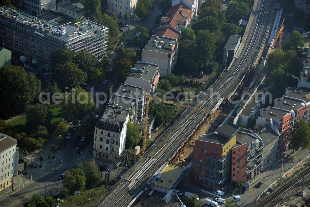 Berlin from above - Construction for the renovation of the railway bridge building to route the train tracks an der Karlshorster Strasse in Berlin in Germany