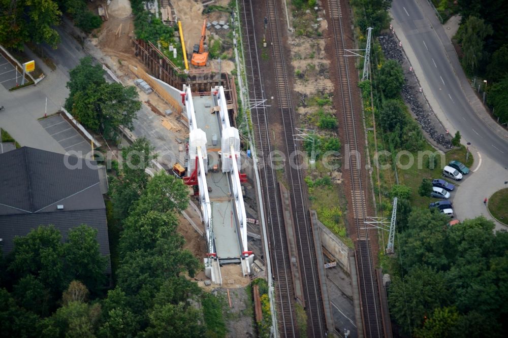 Aerial image Michendorf - Construction for the renovation of the railway bridge building to route the train tracks an der Potsdamer Strasse in Michendorf in the state Brandenburg