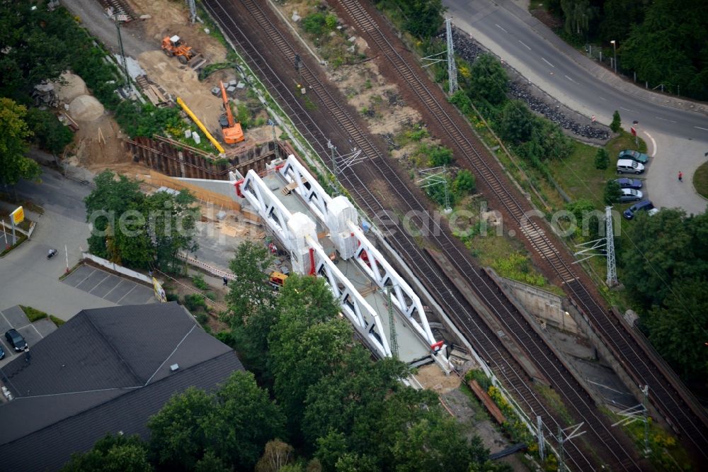 Aerial photograph Michendorf - Construction for the renovation of the railway bridge building to route the train tracks an der Potsdamer Strasse in Michendorf in the state Brandenburg