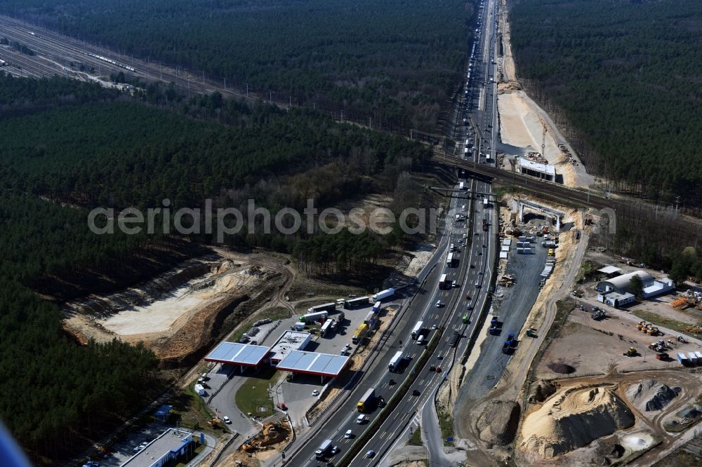 Michendorf from above - Construction for the renovation of the railway bridge building to route the train tracks crossing course of motorway BAB A10 in Michendorf in the state Brandenburg