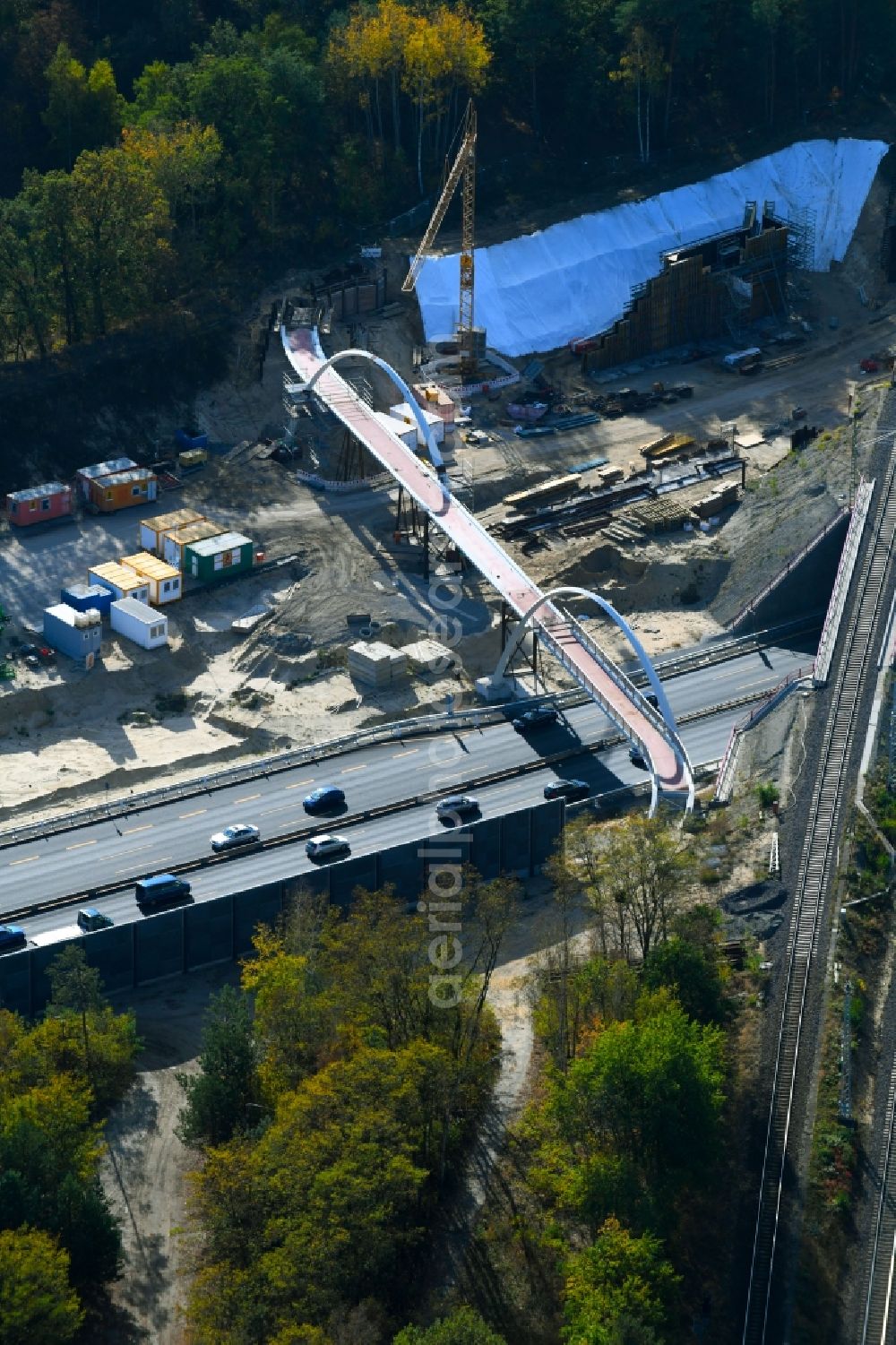 Aerial image Michendorf - Construction for the renovation of the railway bridge building to route the train tracks crossing course of motorway BAB A10 in Michendorf in the state Brandenburg