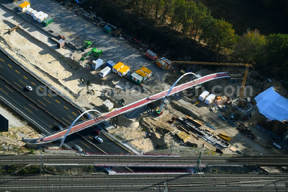 Michendorf from the bird's eye view: Construction for the renovation of the railway bridge building to route the train tracks crossing course of motorway BAB A10 in Michendorf in the state Brandenburg