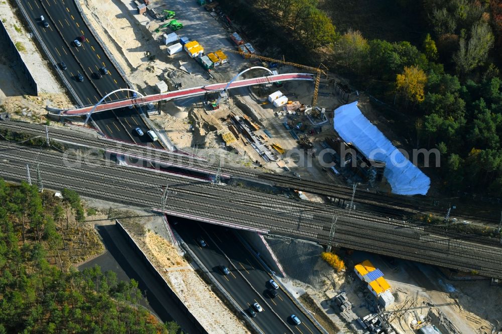 Aerial image Michendorf - Construction for the renovation of the railway bridge building to route the train tracks crossing course of motorway BAB A10 in Michendorf in the state Brandenburg