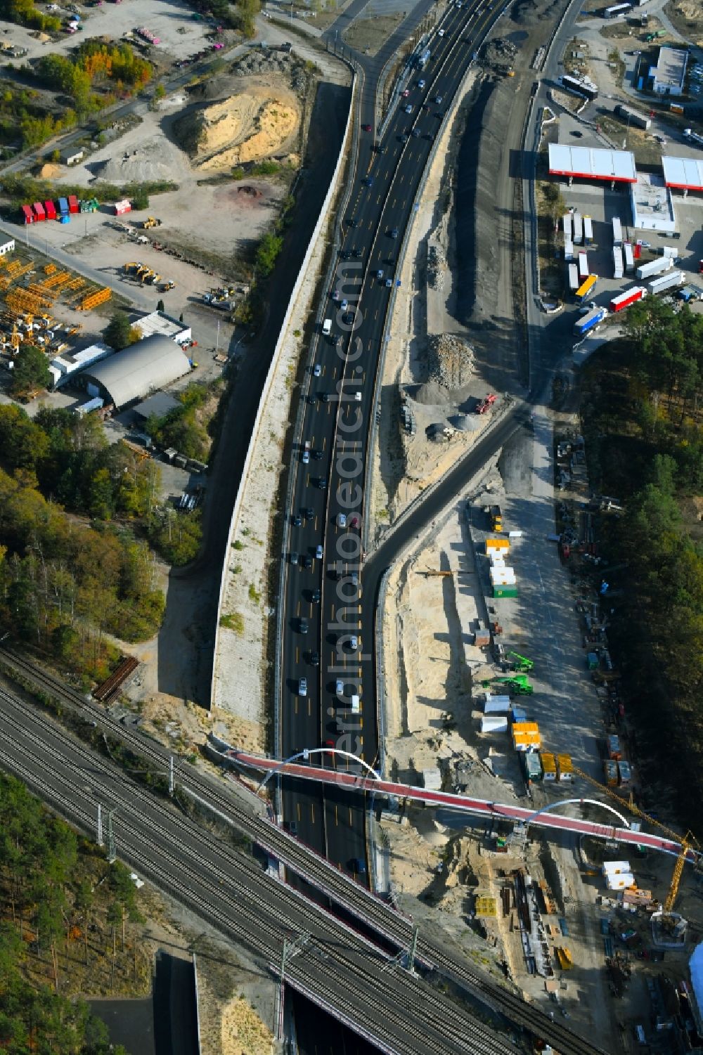 Michendorf from above - Construction for the renovation of the railway bridge building to route the train tracks crossing course of motorway BAB A10 in Michendorf in the state Brandenburg