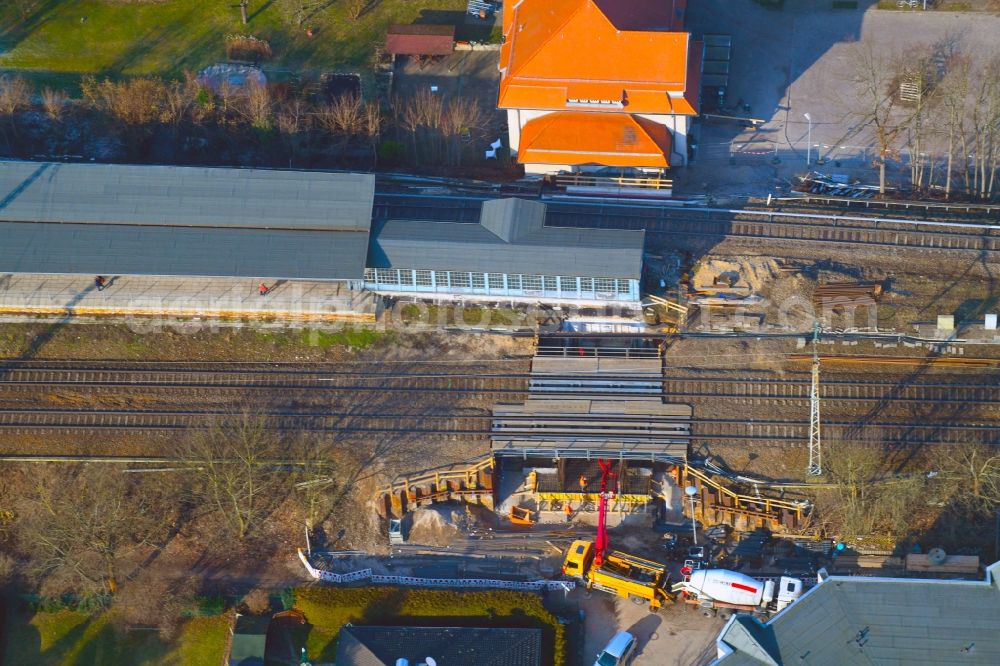 Aerial image Zepernick - Construction for the renovation of the railway bridge building to route the train tracks of station Roentgental on Heinestrasse in Zepernick in the state Brandenburg, Germany