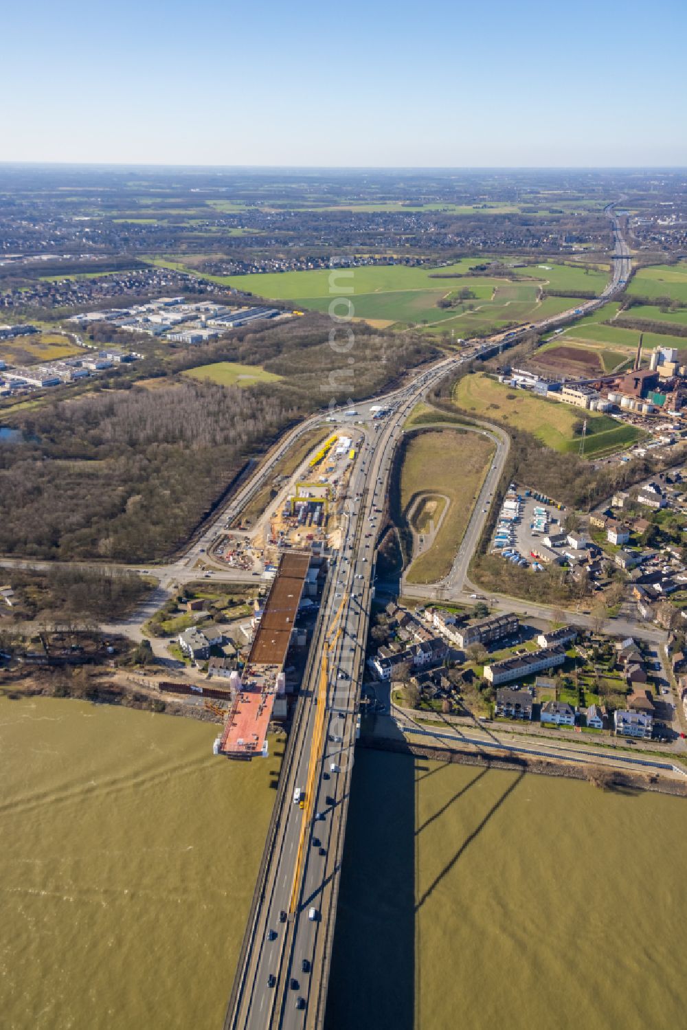 Aerial photograph Duisburg - Construction site for the rehabilitation and repair of the motorway bridge construction Rheinbruecke Duisburg-Neuenkamp in the district Homberg in Duisburg at Ruhrgebiet in the state North Rhine-Westphalia, Germany