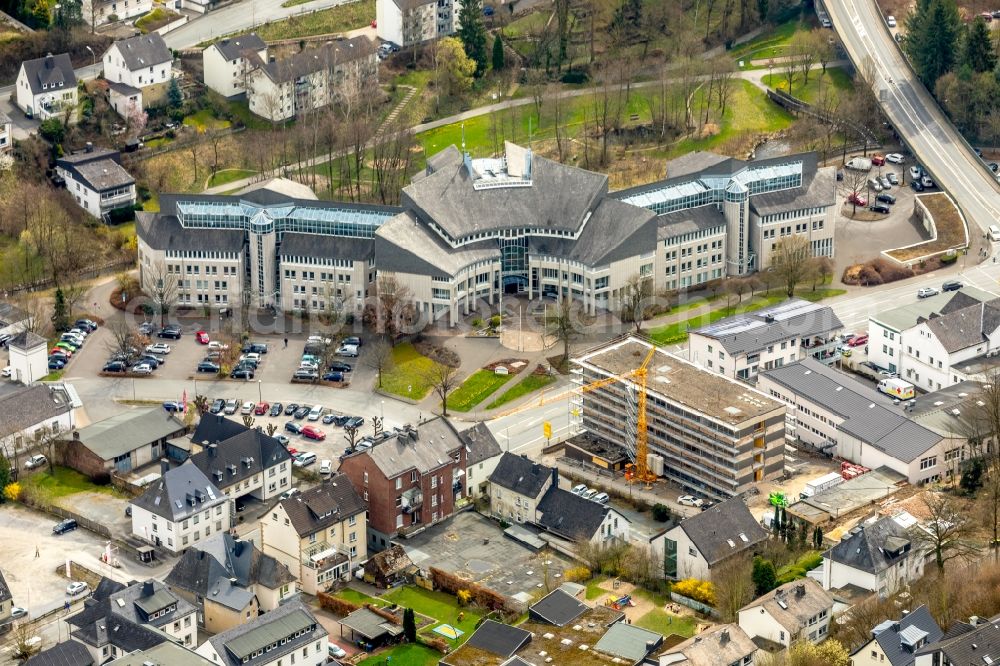 Meschede from the bird's eye view: Construction site for the nrenovation of a Apartments and office building on Steinstrasse in Meschede in the state North Rhine-Westphalia, Germany