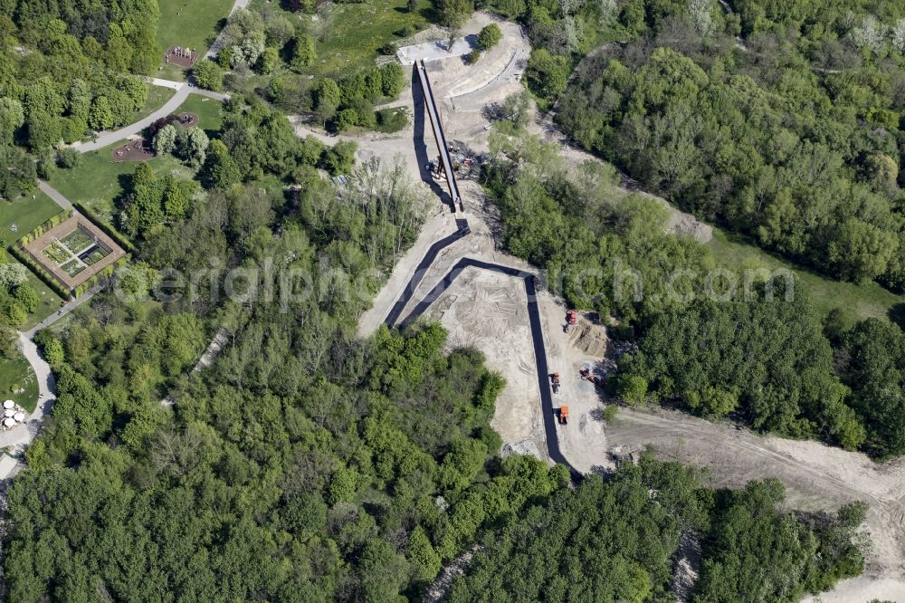 Berlin from above - Construction site of Taelchenbruecke bridge on Kienberg hill on the premises of the IGA 2017 in the district of Marzahn-Hellersdorf in Berlin, Germany. The main attraction of the international garden show will be the Gaerten der Welt which include a new footpath across the hill with the bridge