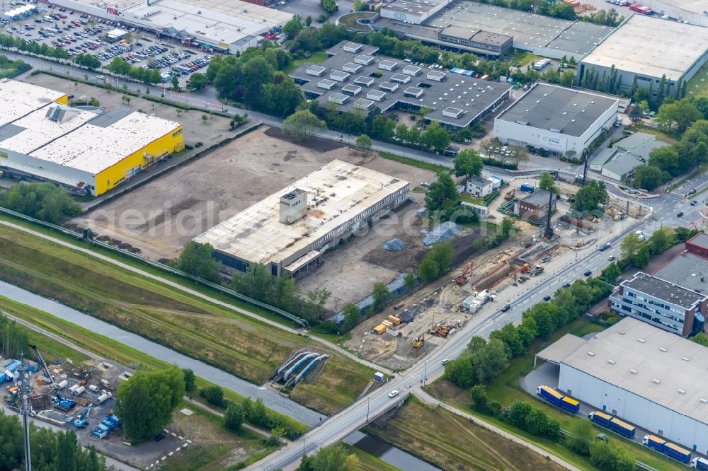 Aerial photograph Gelsenkirchen - Construction site with earthworks and landfills for the laying of pipelines for the sewer on the premises of Friedr. Gustav Theis Kaltwalz-werke GmbH on Adenauerallee corner Emscherstrasse in Gelsenkirchen at Ruhrgebiet in the state North Rhine-Westphalia, Germany