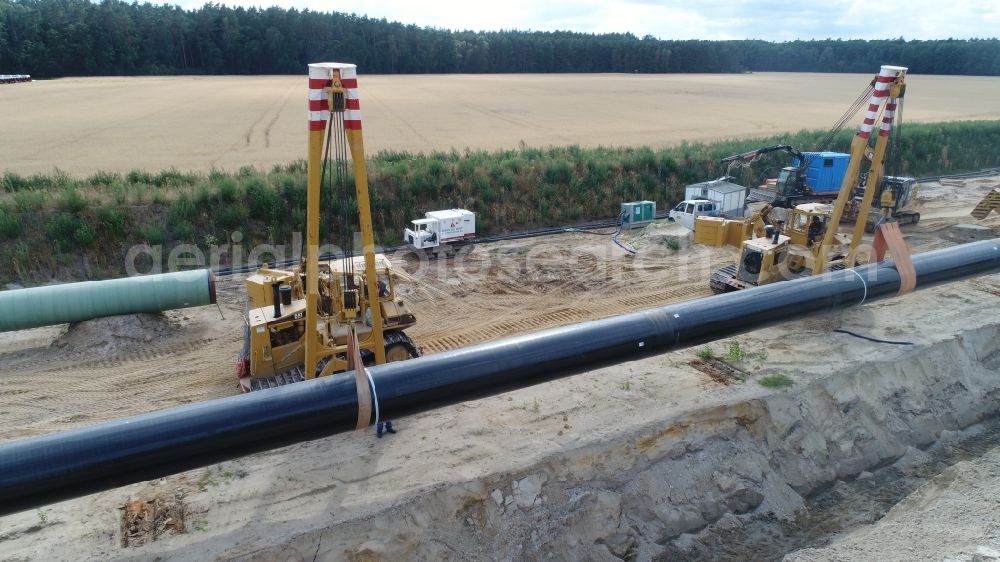 Aerial photograph Anklam - Construction site with earthworks and landfills for the laying of pipelines of the Eugal natural gas pipeline in Anklam in the state Mecklenburg - Western Pomerania, Germany