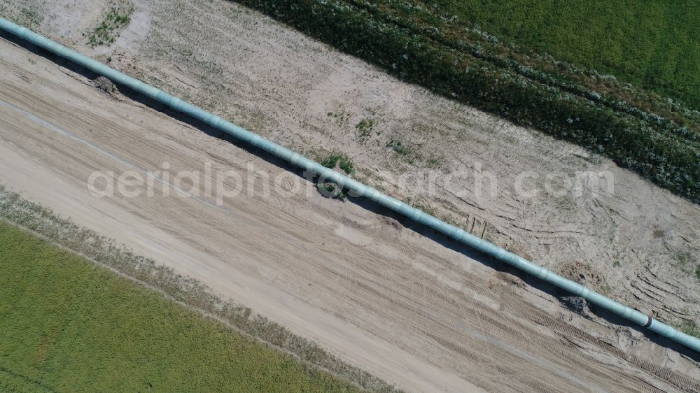 Stolpe an der Peene from the bird's eye view: Construction site with earthworks and landfills for the laying of pipelines of the Eugal gas pipeline in Stolpe an der Peene in the state Mecklenburg - Western Pomerania, Germany