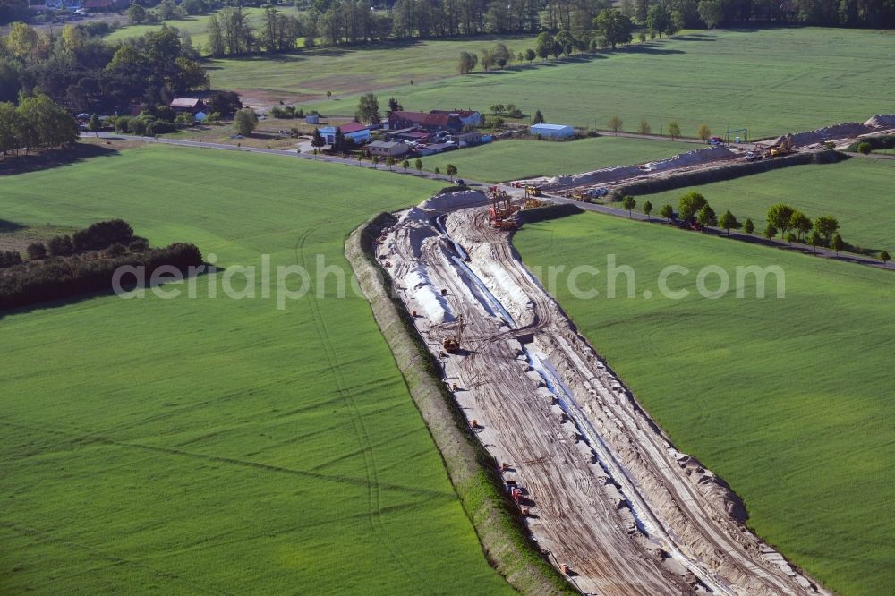 Gersdorf from the bird's eye view: Construction site with earthworks and landfills for the laying of pipelines of the new European Gas Lines (Eugal) on fields in Gross Koeris in the state Brandenburg, Germany