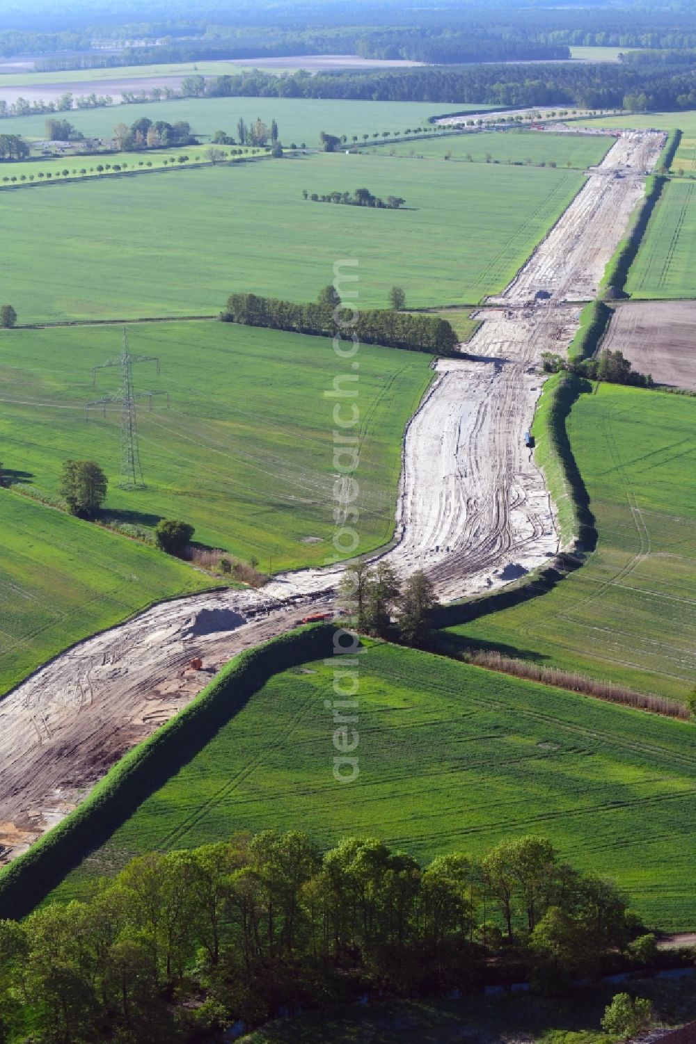 Aerial photograph Gersdorf - Construction site with earthworks and landfills for the laying of pipelines of the new European Gas Lines (Eugal) on fields in Gross Koeris in the state Brandenburg, Germany