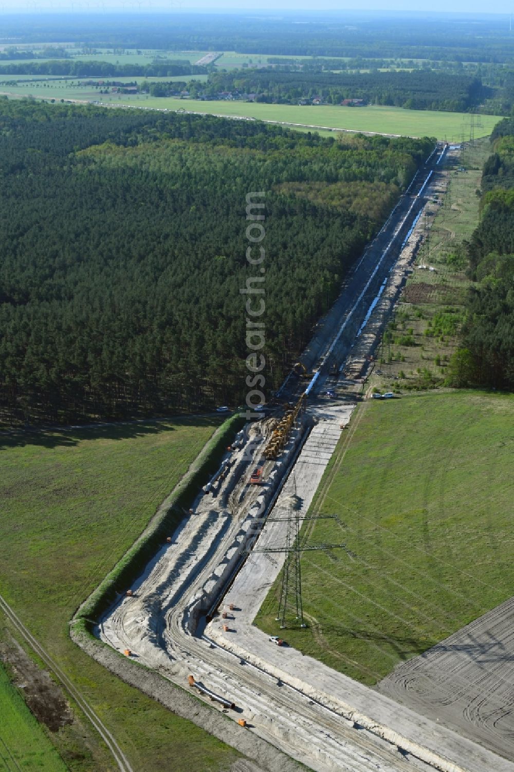 Friedrichshof from above - Construction site with earthworks and landfills for the laying of pipelines of the new European Gas Lines (Eugal) on a field in Gross Koeris in the state Brandenburg, Germany