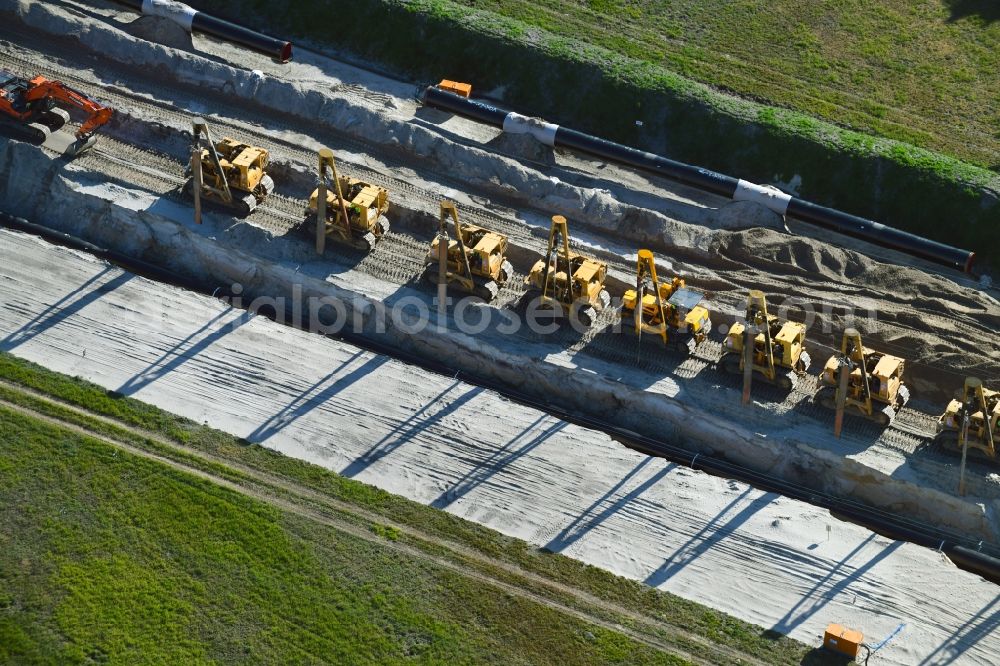 Aerial image Friedrichshof - Construction site with earthworks and landfills for the laying of pipelines of the new European Gas Lines (Eugal) on a field in Gross Koeris in the state Brandenburg, Germany