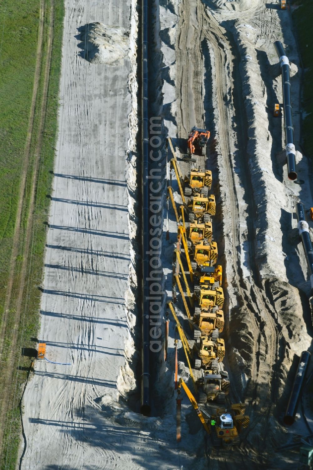 Aerial image Friedrichshof - Construction site with earthworks and landfills for the laying of pipelines of the new European Gas Lines (Eugal) on a field in Gross Koeris in the state Brandenburg, Germany