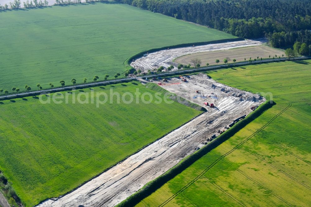 Golßen from the bird's eye view: Construction site with earthworks and landfills for the laying of pipelines of the new European Gas Lines (Eugal) on a field near Gross Koeris in the state Brandenburg, Germany