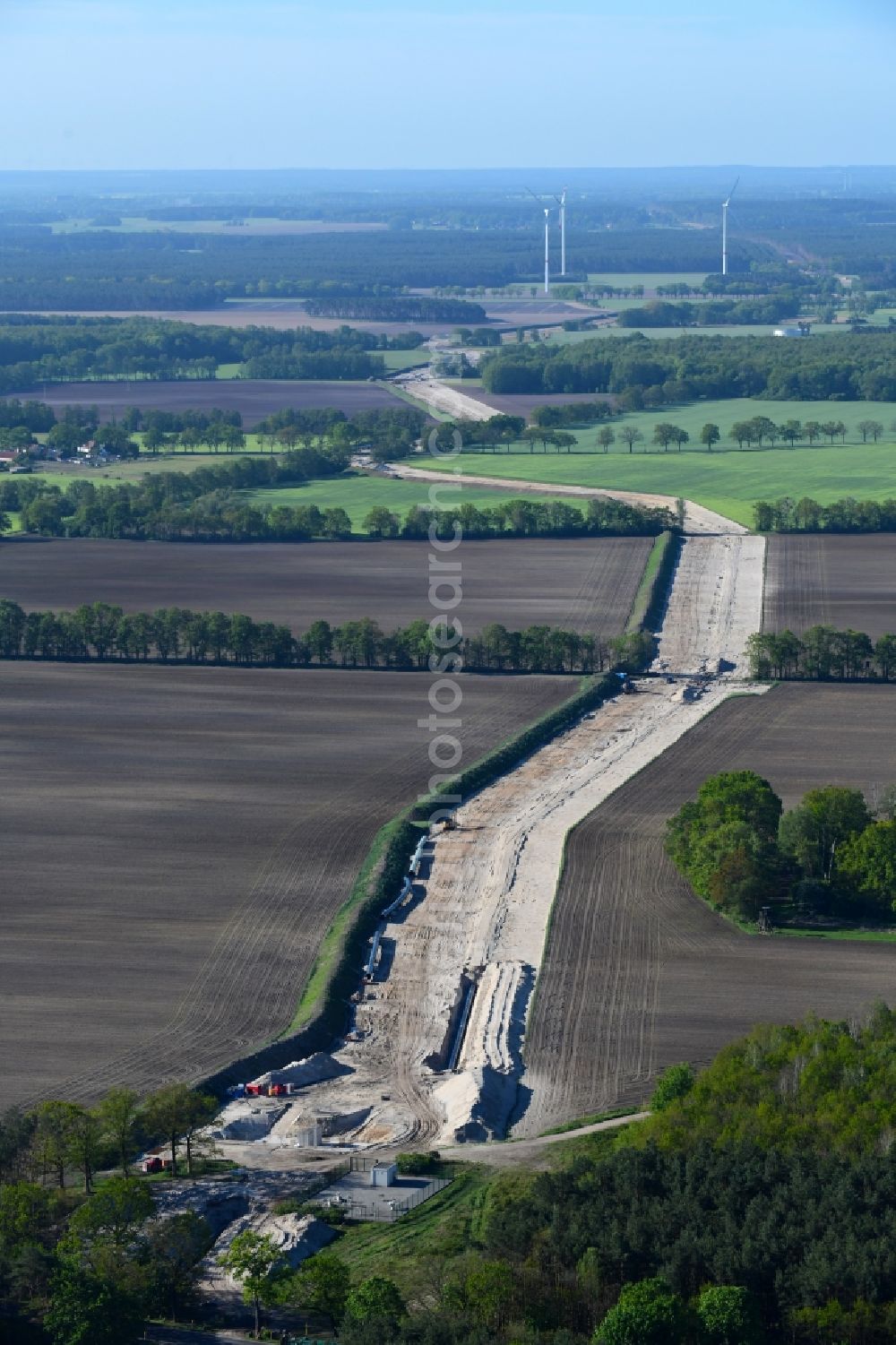 Aerial photograph Golßen - Construction site with earthworks and landfills for the laying of pipelines of the new European Gas Lines (Eugal) on a field near Gross Koeris in the state Brandenburg, Germany