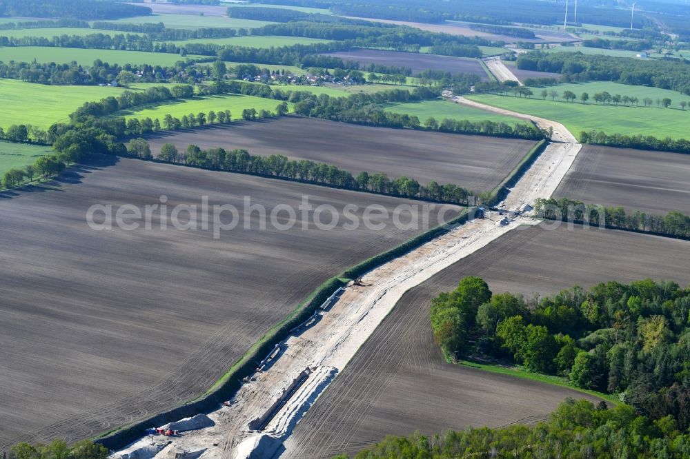 Golßen from the bird's eye view: Construction site with earthworks and landfills for the laying of pipelines of the new European Gas Lines (Eugal) on a field near Gross Koeris in the state Brandenburg, Germany