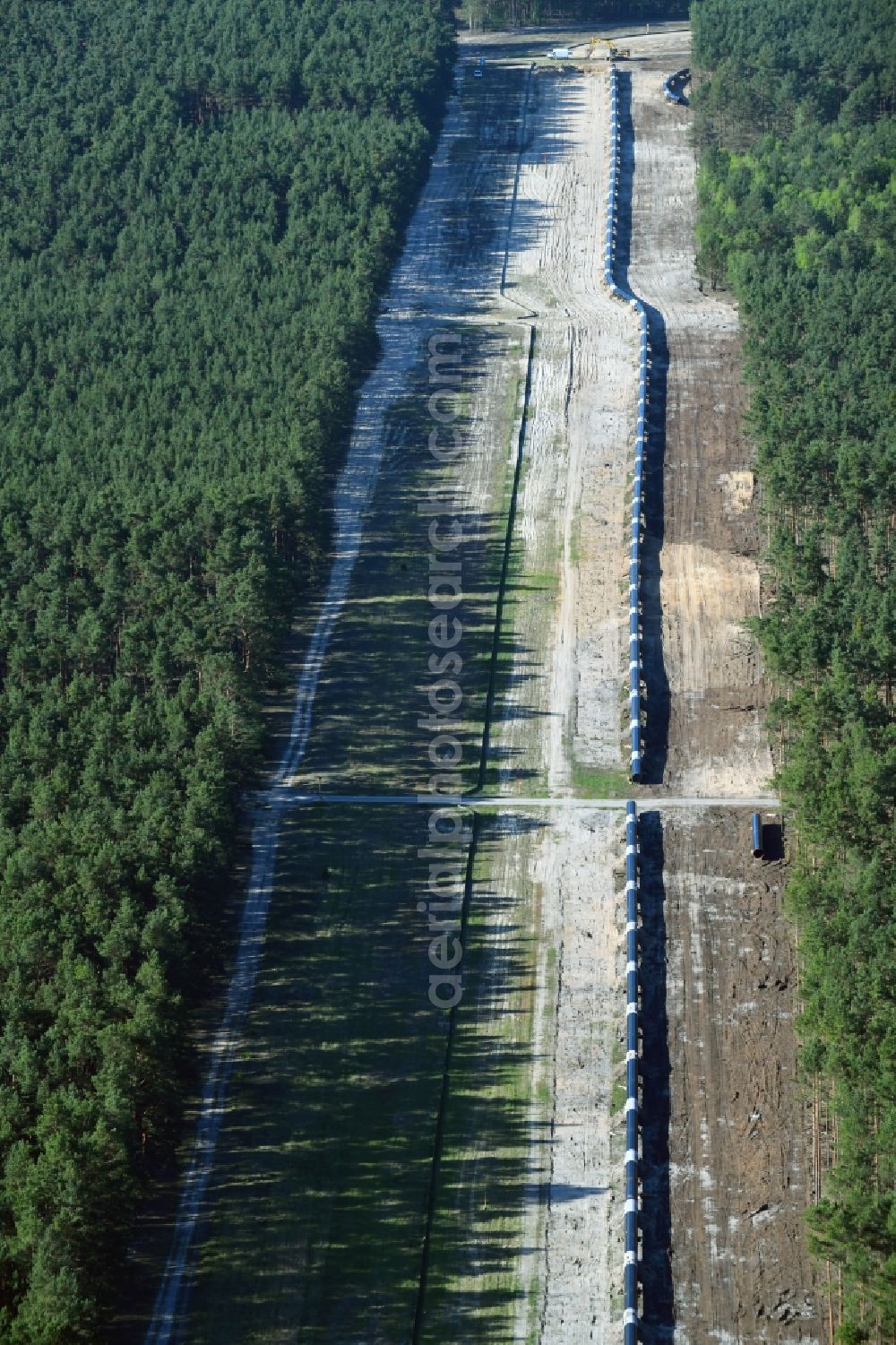 Groß Köris from above - Construction site with earthworks and landfills for the laying of pipelines of the new European Gas Lines (Eugal) in a forest in einem Wald in Gross Koeris in the state Brandenburg, Germany