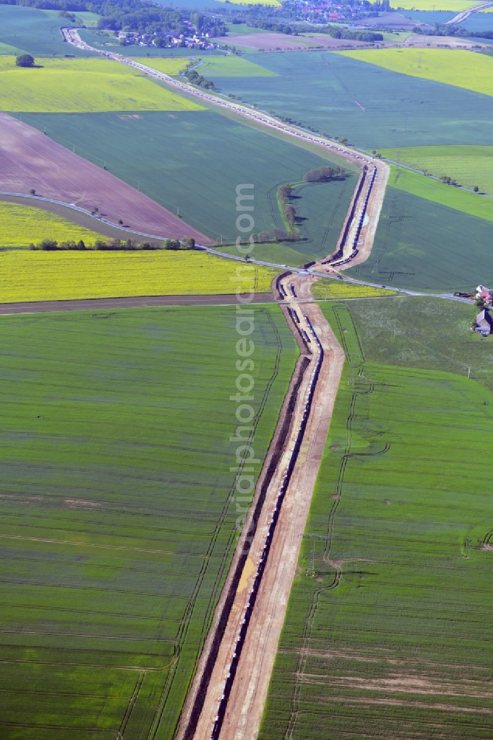 Aerial image Rostig - Construction site with earthworks and landfills for the laying of pipelines of the new European Gas Lines (Eugal) in a forest in einem Wald in Gross Koeris in the state Brandenburg, Germany