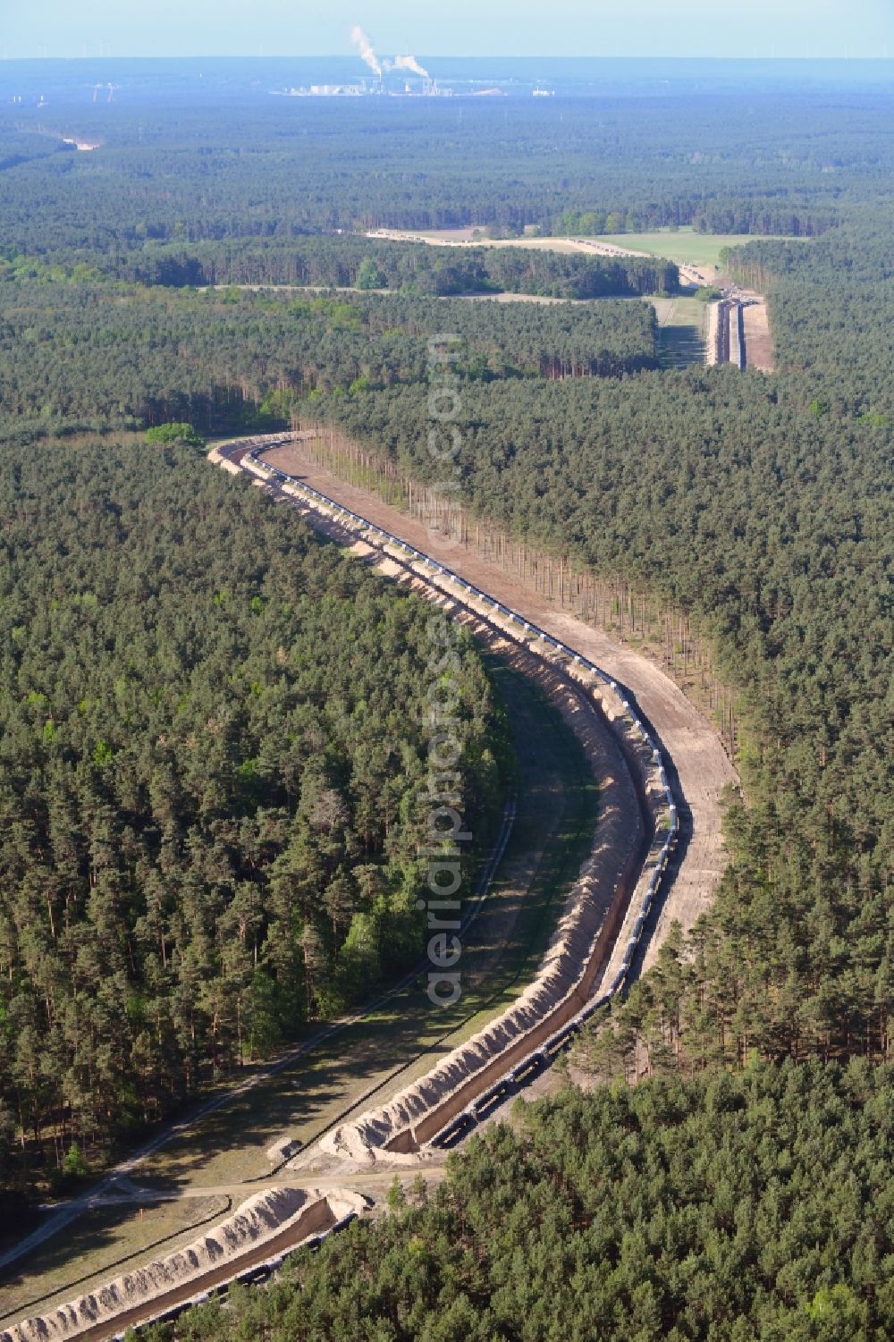 Teupitz from above - Construction site with earthworks and landfills for the laying of pipelines of the new European Gas Lines (Eugal) in a forest in einem Wald in Gross Koeris in the state Brandenburg, Germany