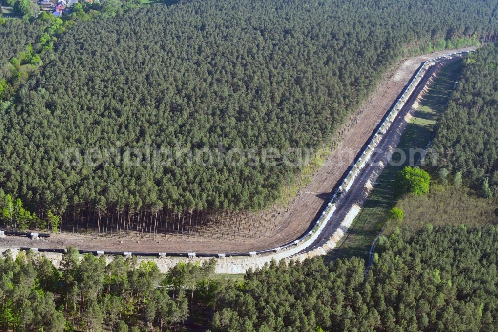 Aerial photograph Teupitz - Construction site with earthworks and landfills for the laying of pipelines of the new European Gas Lines (Eugal) in a forest in einem Wald in Gross Koeris in the state Brandenburg, Germany