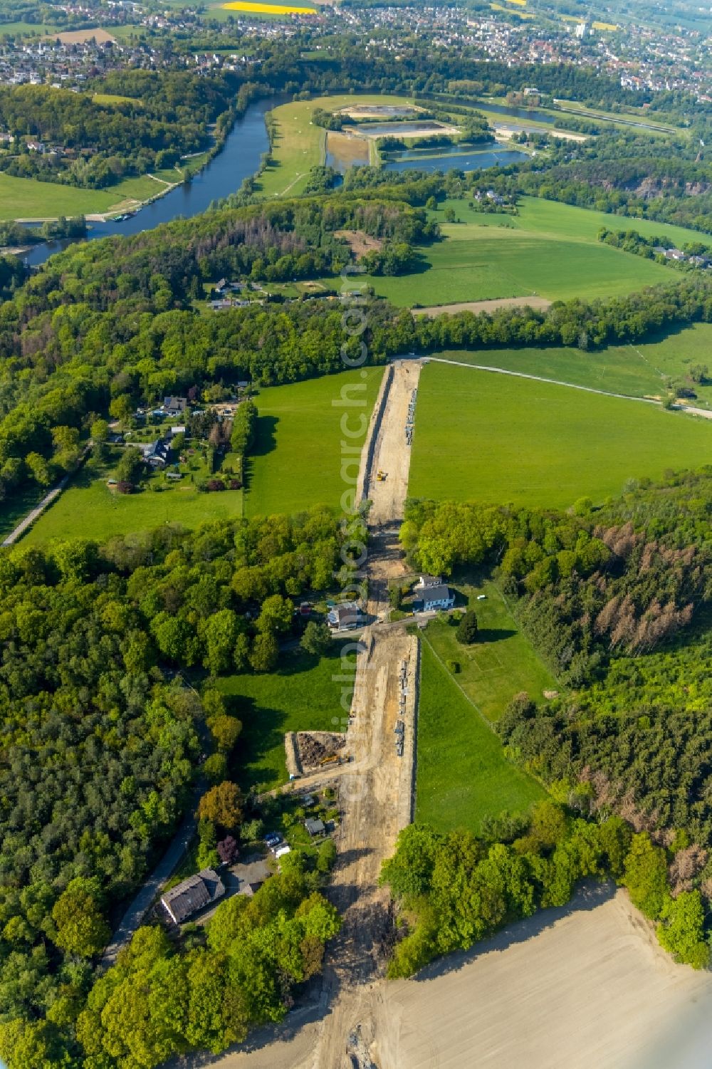 Witten from the bird's eye view: Construction site with earthworks and landfills for the laying of pipelines of the Wasserleitung along the Berghauser Strasse beginnend on Rauendahler Strasse in the district Bommern in Witten in the state North Rhine-Westphalia, Germany