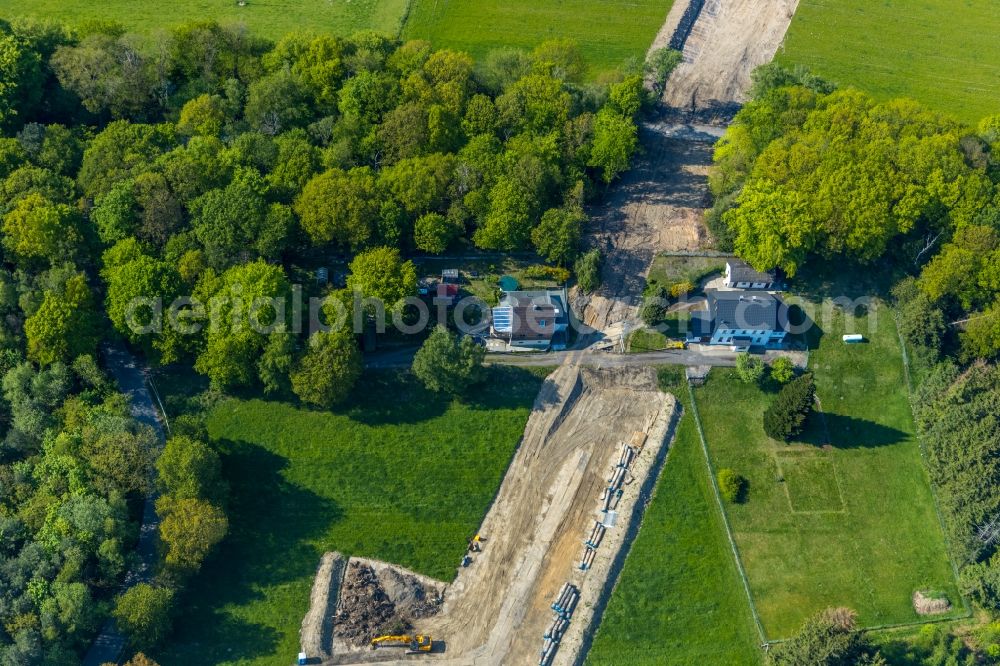 Witten from above - Construction site with earthworks and landfills for the laying of pipelines of the Wasserleitung along the Berghauser Strasse beginnend on Rauendahler Strasse in the district Bommern in Witten in the state North Rhine-Westphalia, Germany