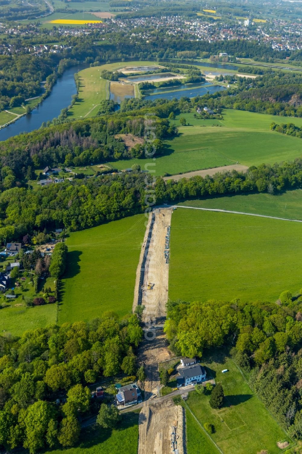 Witten from the bird's eye view: Construction site with earthworks and landfills for the laying of pipelines of the Wasserleitung along the Berghauser Strasse beginnend on Rauendahler Strasse in the district Bommern in Witten in the state North Rhine-Westphalia, Germany