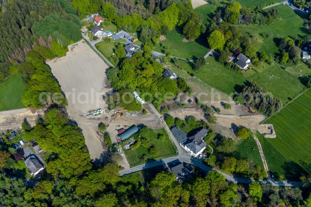 Aerial photograph Witten - Construction site with earthworks and landfills for the laying of pipelines of the Wasserleitung along the Berghauser Strasse beginnend on Rauendahler Strasse in the district Bommern in Witten in the state North Rhine-Westphalia, Germany