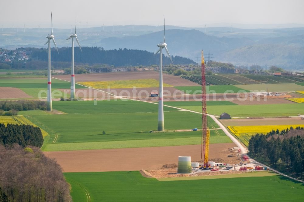 Brilon from the bird's eye view: Construction site for wind turbine installation on a field in Brilon in the state North Rhine-Westphalia