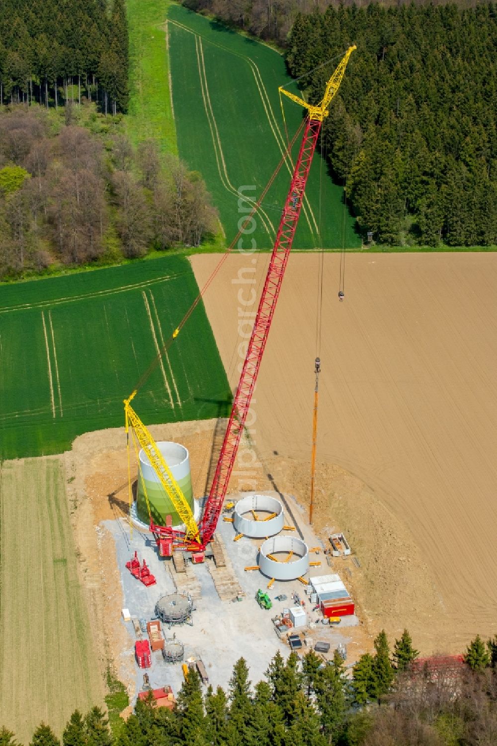 Brilon from the bird's eye view: Construction site for wind turbine installation on a field in Brilon in the state North Rhine-Westphalia