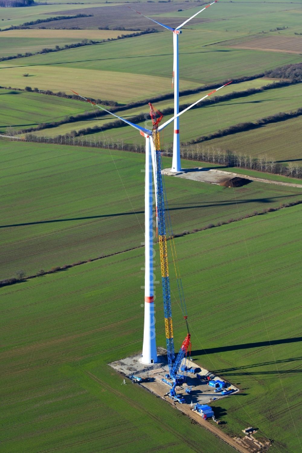 Großbrüchter from the bird's eye view: Construction site for wind turbine installation on a field in Grossbruechter in the state Thuringia, Germany