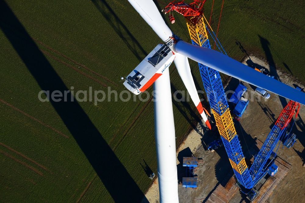 Aerial photograph Großbrüchter - Construction site for wind turbine installation on a field in Grossbruechter in the state Thuringia, Germany