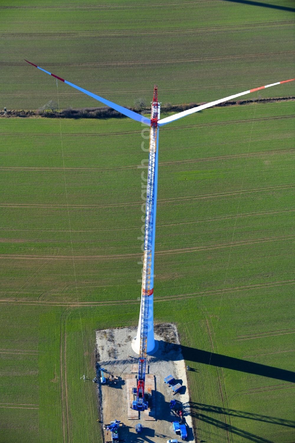 Aerial image Großbrüchter - Construction site for wind turbine installation on a field in Grossbruechter in the state Thuringia, Germany