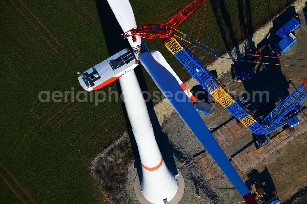 Großbrüchter from the bird's eye view: Construction site for wind turbine installation on a field in Grossbruechter in the state Thuringia, Germany