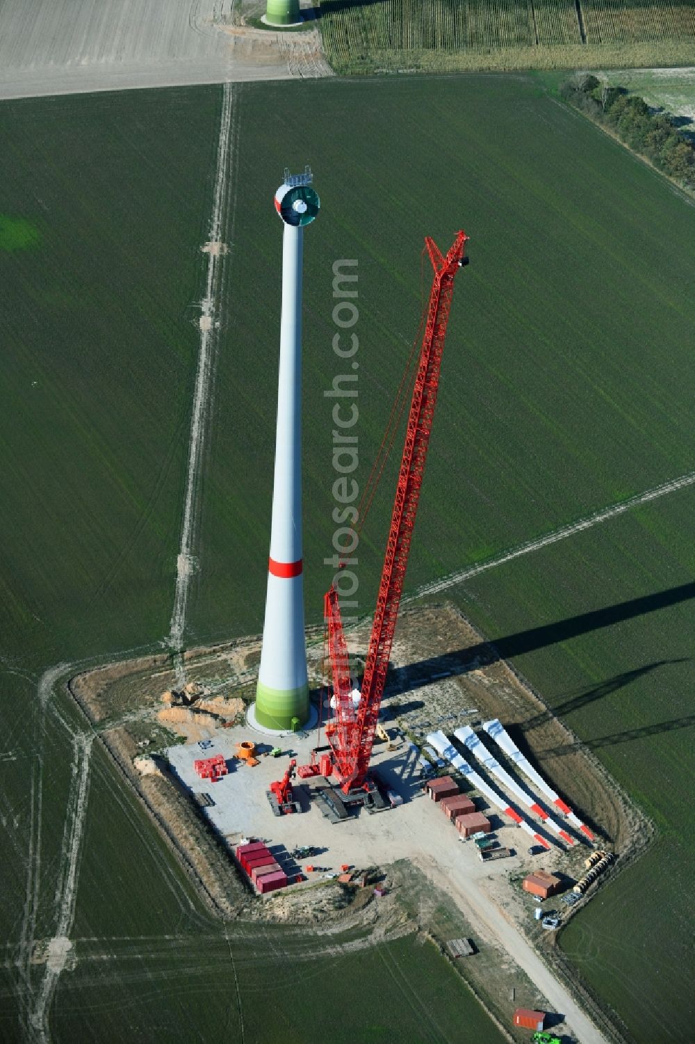 Niedergörsdorf from above - Construction site for wind turbine installation on a field in Niedergoersdorf in the state Brandenburg, Germany