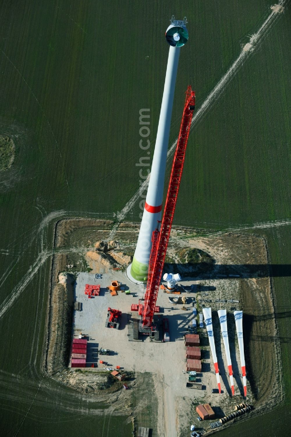 Aerial image Niedergörsdorf - Construction site for wind turbine installation on a field in Niedergoersdorf in the state Brandenburg, Germany